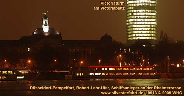 Rheinschiff s401eure-eur1 am Schiffsanleger  an der Rheinterrasse am Robert-Lehr-Ufer in Dsseldorf-Pempelfort. Im Hintergrund der Victoriaturm am Victoriaplatz.